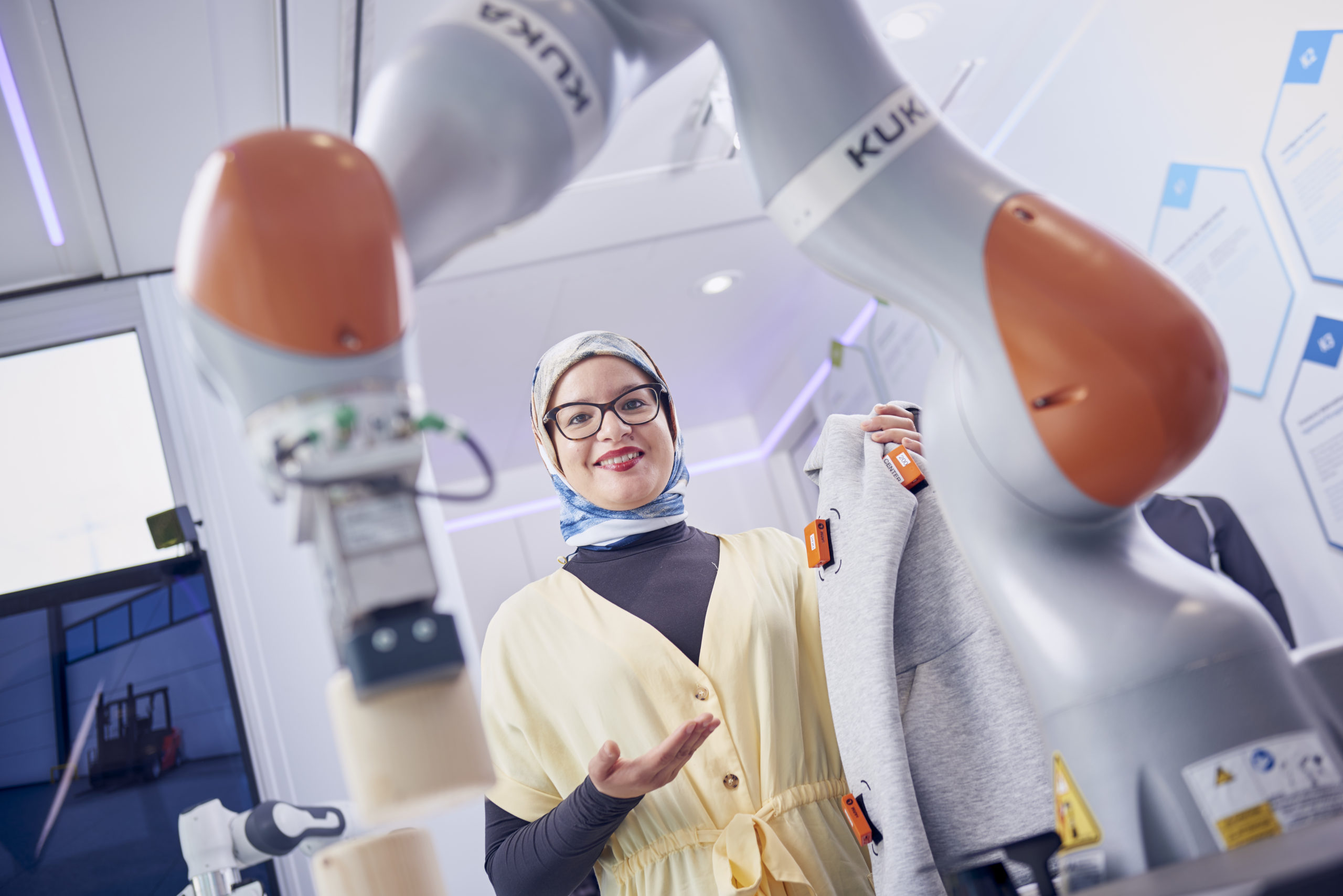 Image of a researcher using a robotic arm