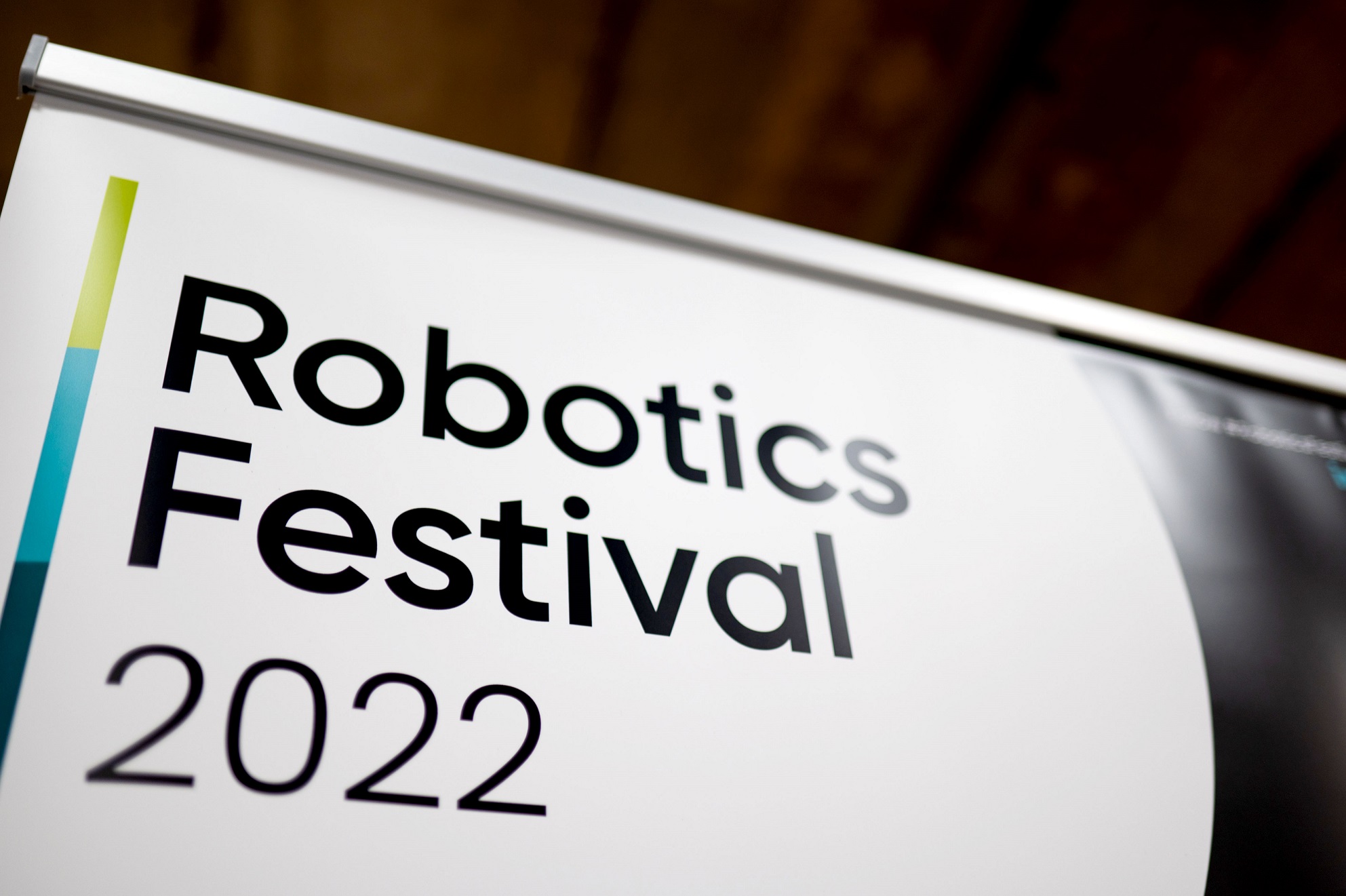 Picture of a poster with "Robotics Festival 2022" written on it