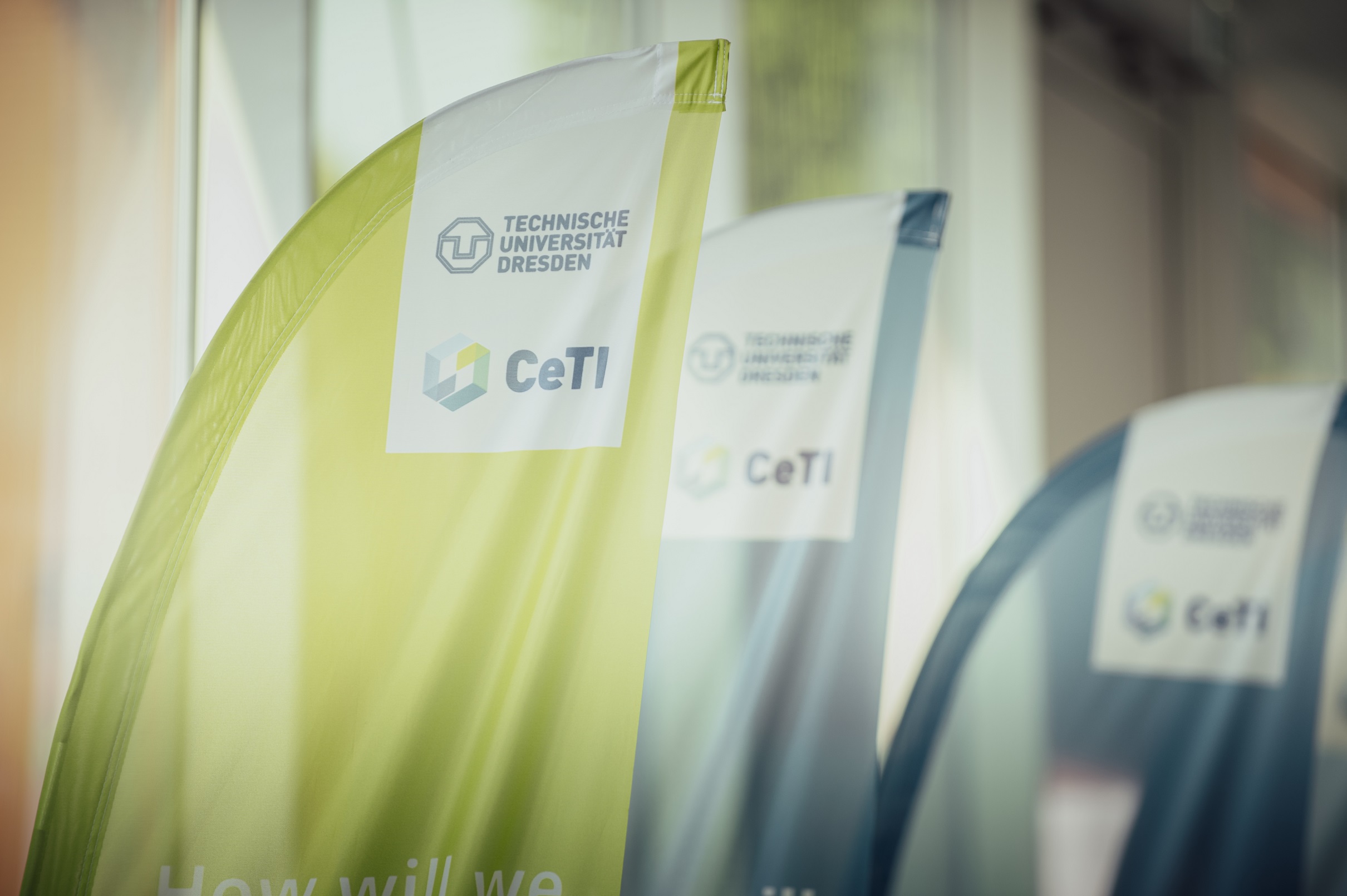 Photograph of three CeTI flag banners